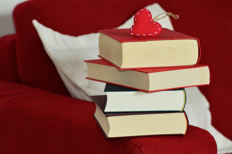 Dear Mrs Bird book cover, postcard with balloons, candle, green plant flat lay